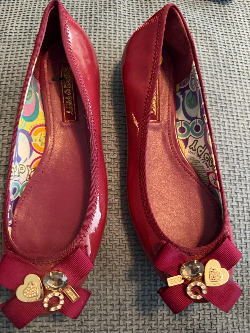 Coach Burgundy Patent Ballet Flats with Heart Bow Accents